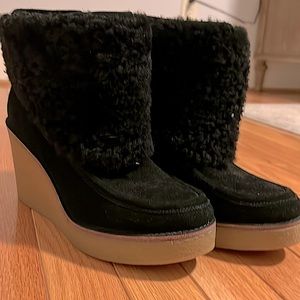 Black, extra fuzzy high-heeled UGGs, size 9
